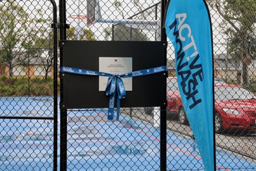 Plaque at Carlson Reserve multi-purpose courts