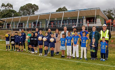 Mayor Cr Paul Klisaris with Mazenod Football Club, Mulgrave Wheelers Hill Cricket Club and contractor Shape outside Brandon Park Reserve modules delivered Sep 2025