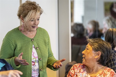 Two older women talking