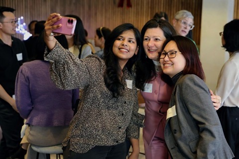 3 women taking a selfie at a business networking event