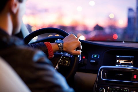 Person driving a car