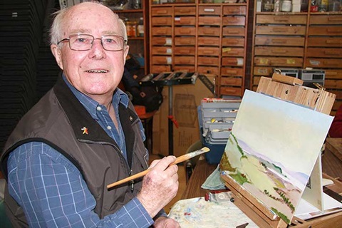 Alistair Pilley photographed painting