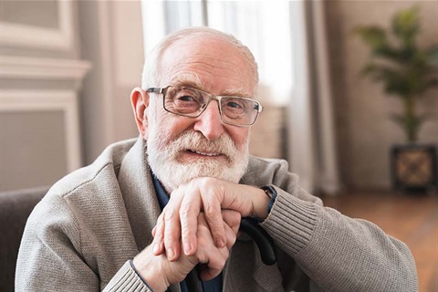 Grey haired older man