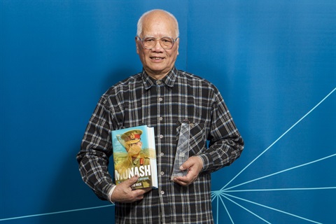 Multicultural Champion Binquan Yan with awards