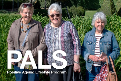 Cover of the spring edition of the PALS program showing three women outdoors, smiling for the camera in full sun