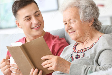 Support worker reading the book