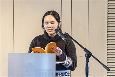 Poetic Portraits writer Crystal Lim reading at the launch