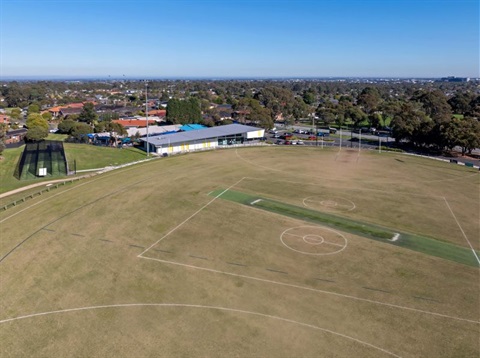 A shot of Columbia Park Reserve from the sky showing the oval, pavilion and cricket nets